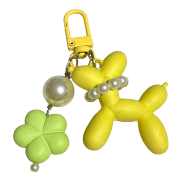 Llavero de perrito amarillo flor