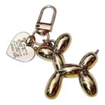 Llavero de perrito corazon - dorado